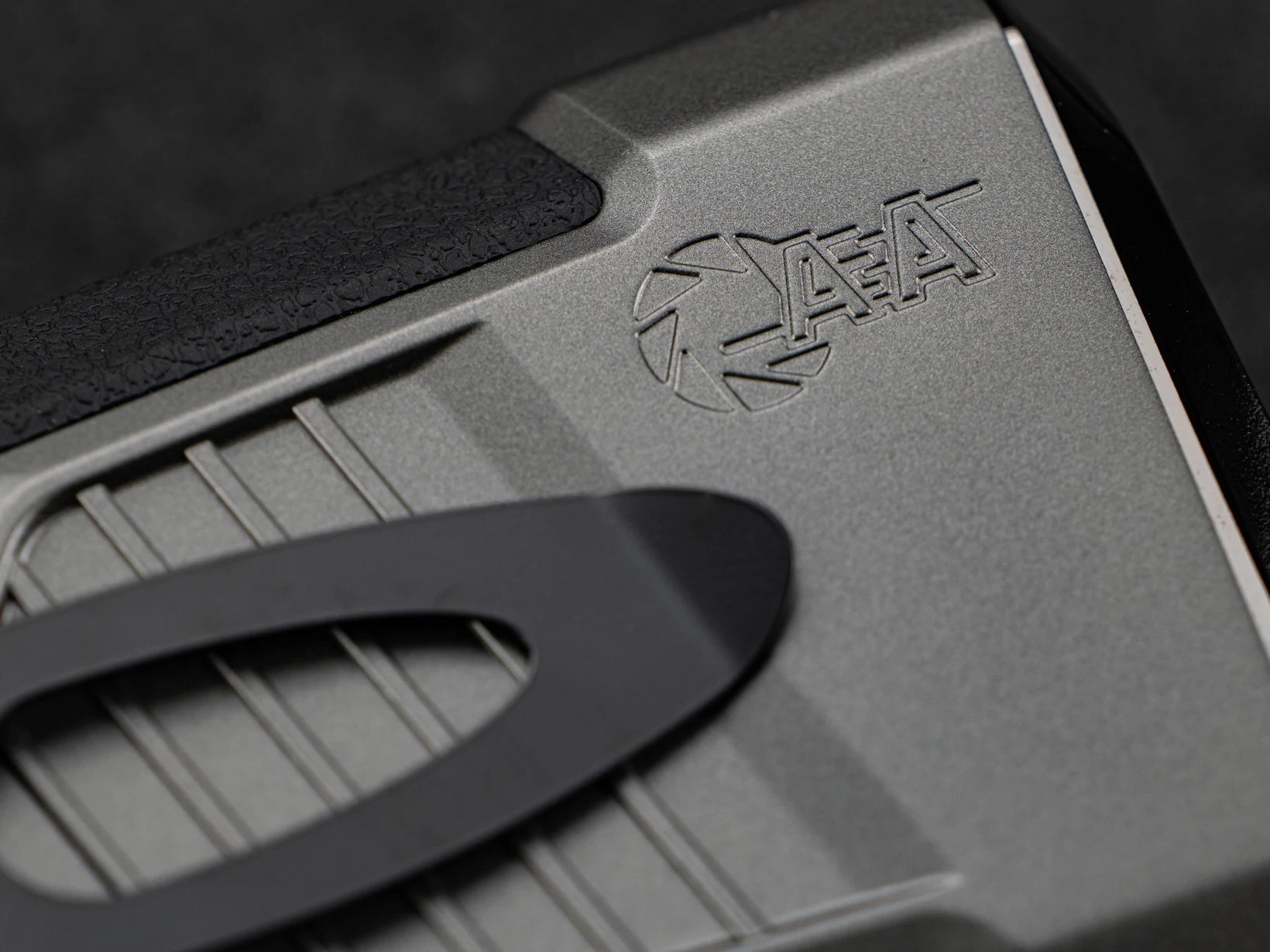 Real close-up of the AEA logo, housing and textured grip on the rangefinder